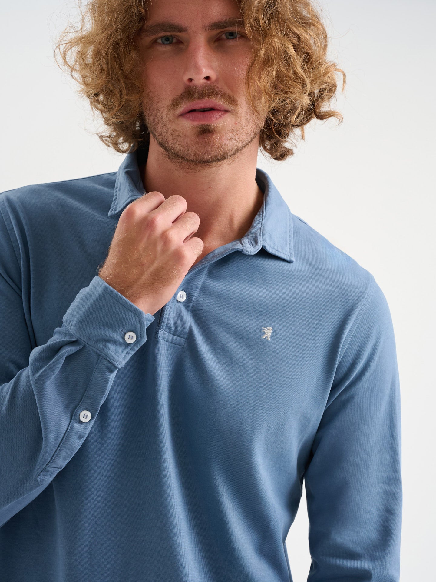 Polo maniche lunghe tre bottoni