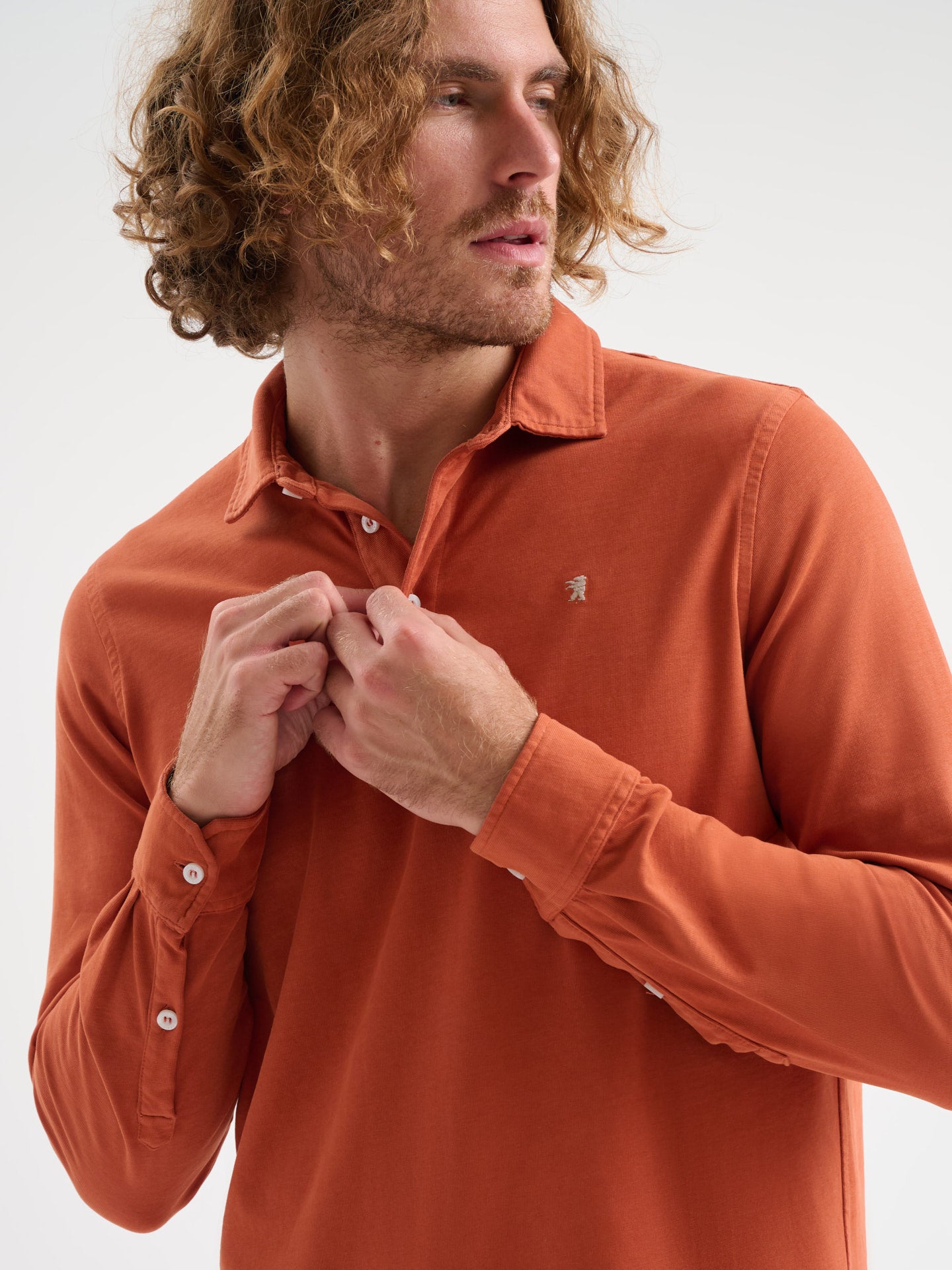 Polo maniche lunghe tre bottoni