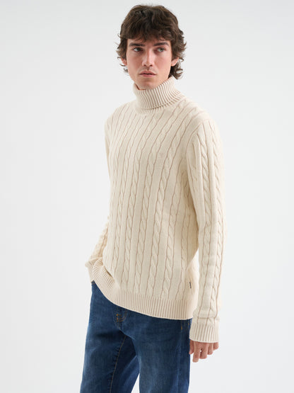 Maglia a collo alto in treccia